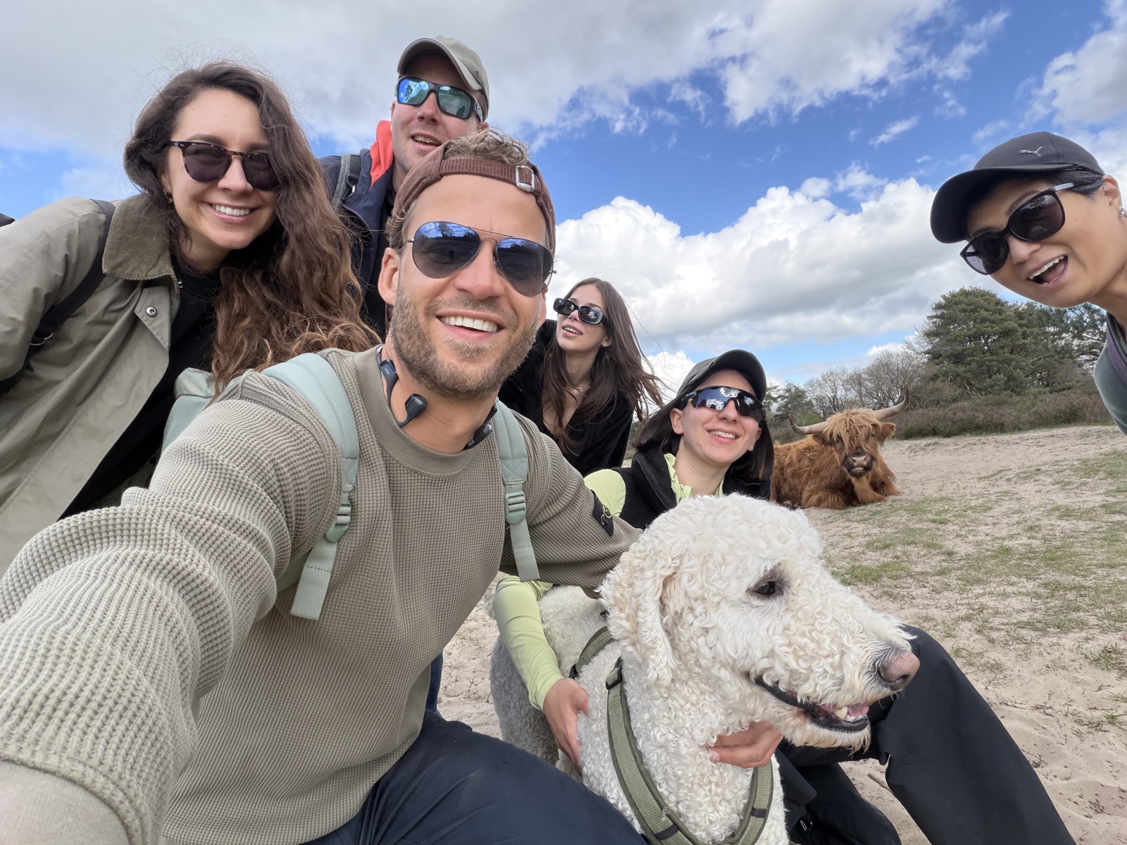 The GoDoIt community together on a hike with the dog