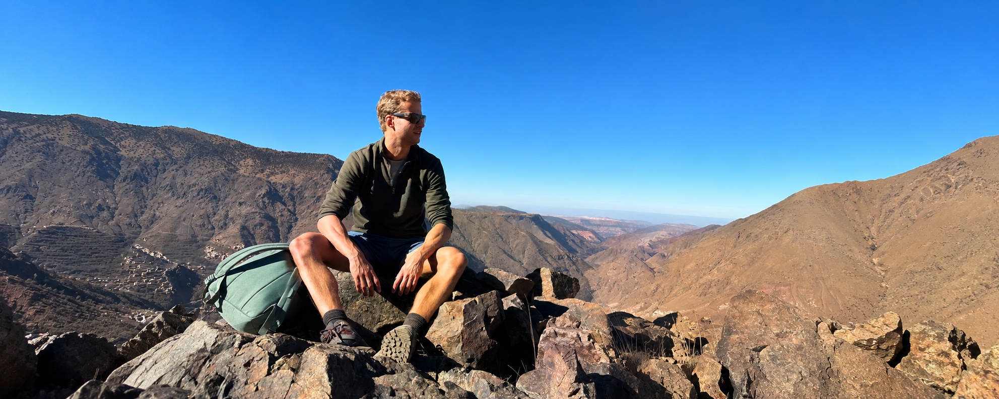 Floris on a mountaintop in Morocco overlooking the valley